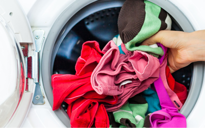 Wash clothes in hot water and dry with high heat